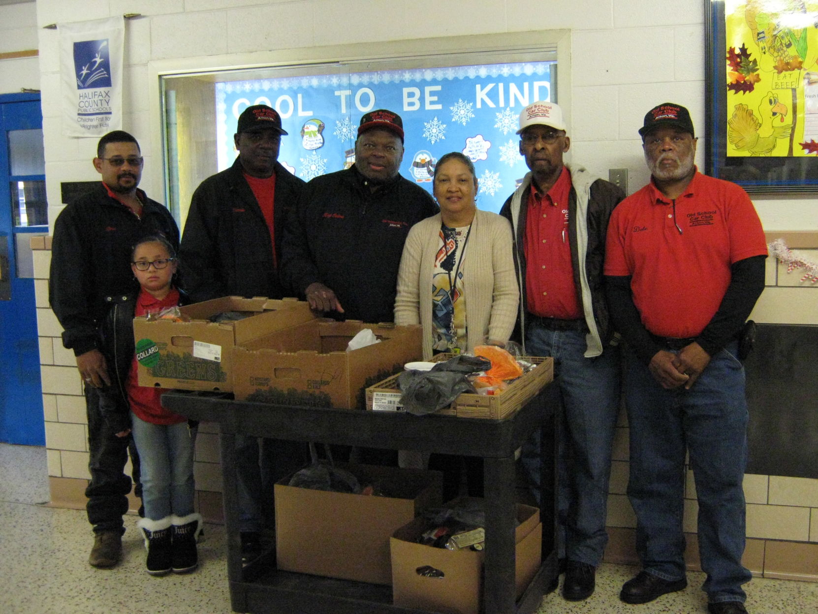 Old School Car Club makes donation to Sinai Elementary School